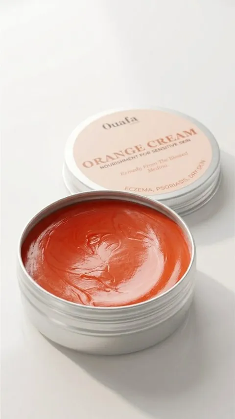 Geopend blikje Ouafa Orange Cream met de warme oranje crème